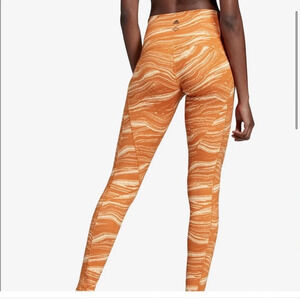 Women’s Adidas Wanderlust Leggings. Size Medium. Believe This Orange leggings.